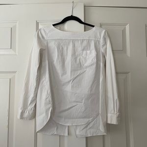 White blouse with buttons down the back